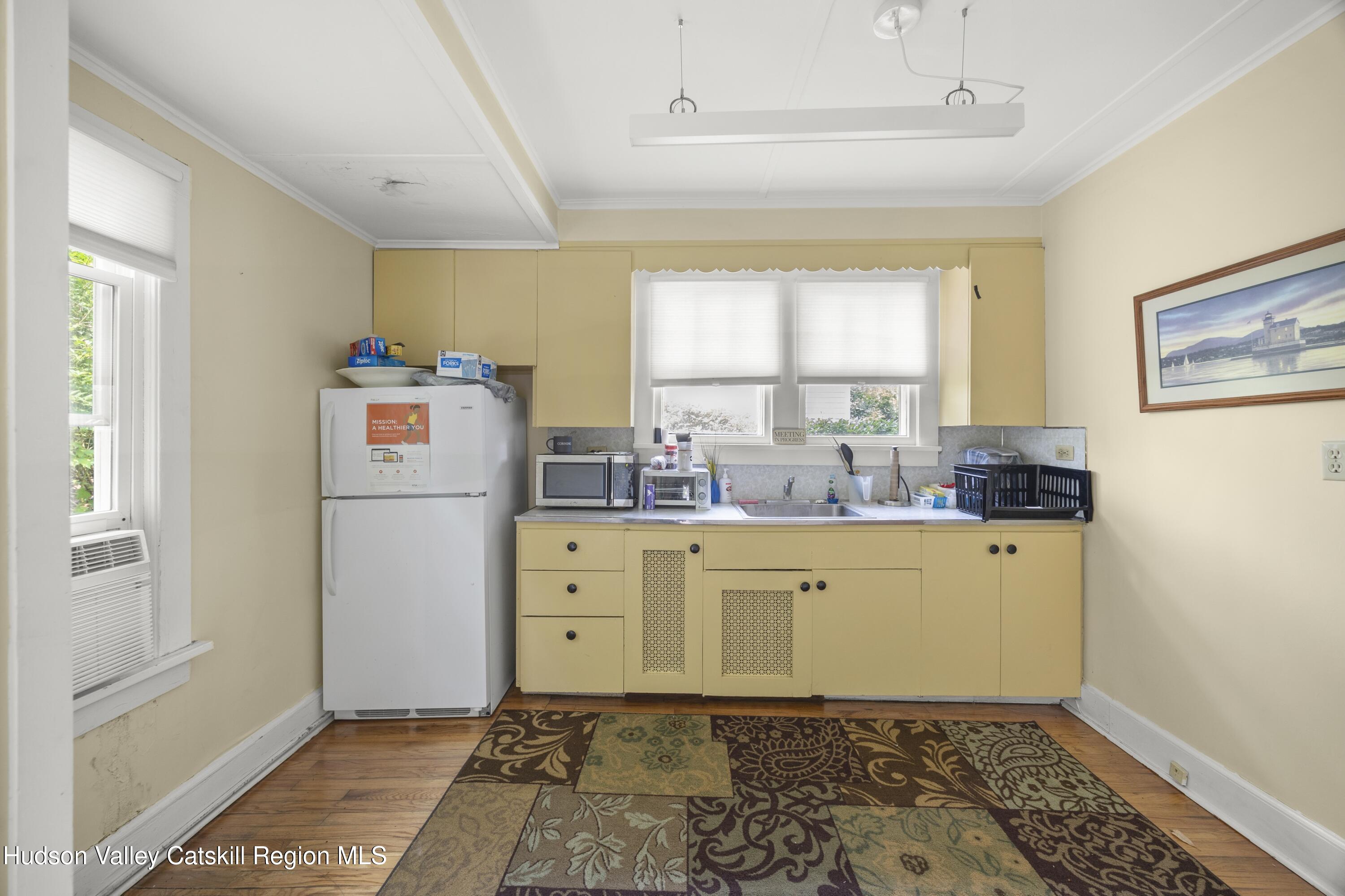 207 Maple Avenue Germantown, NY 12526 - Photo 6 of 8 a room with window washer and dryer