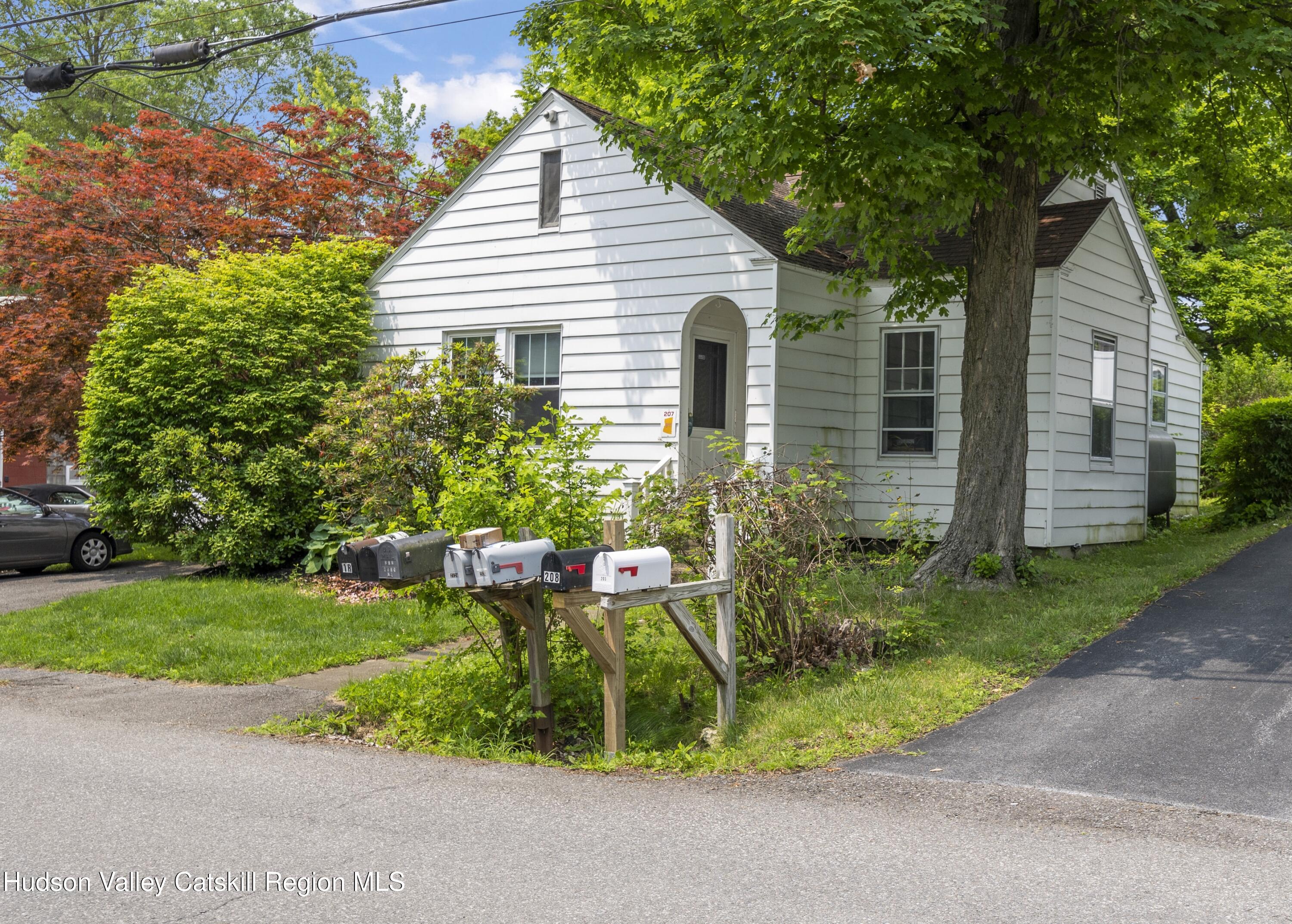 207 Maple Avenue Germantown, NY 12526 - Photo 8 of 8 a view of a chair and table in the garden