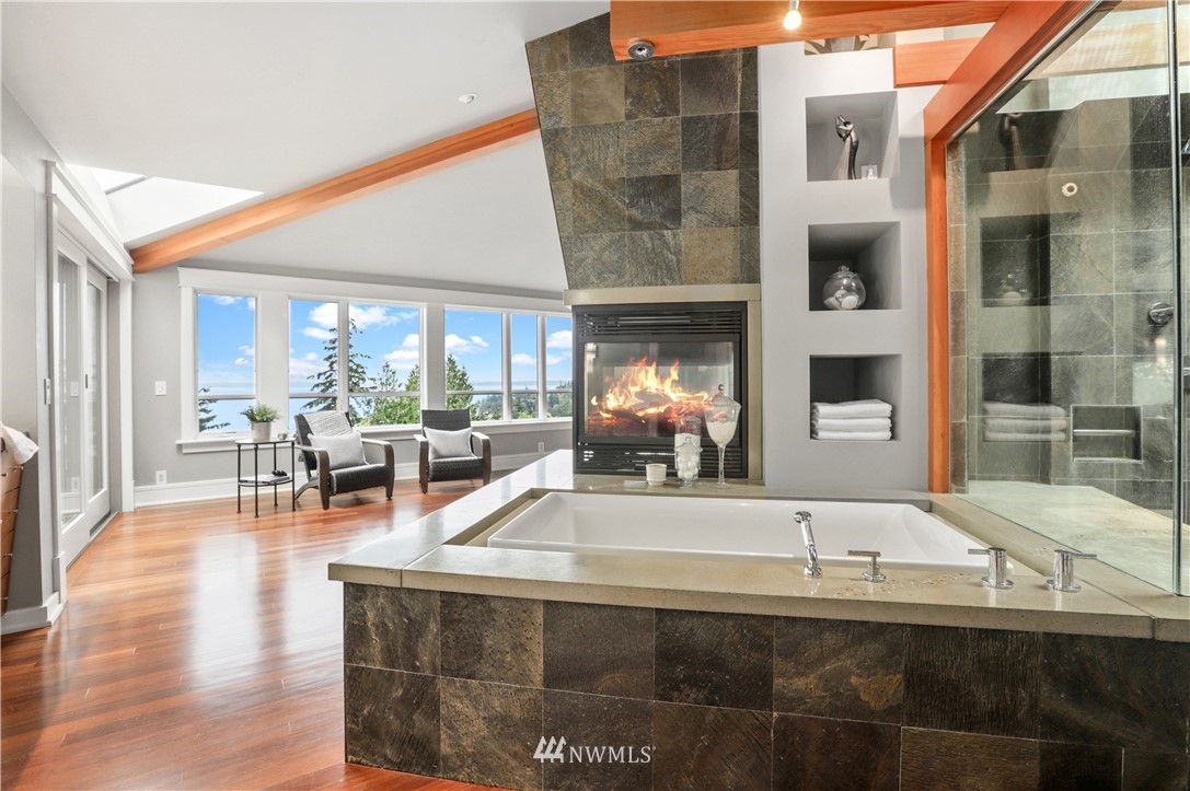 711 Briar Road Bellingham, WA 98225 - Photo 17 of 40 a living room with furniture and a fireplace