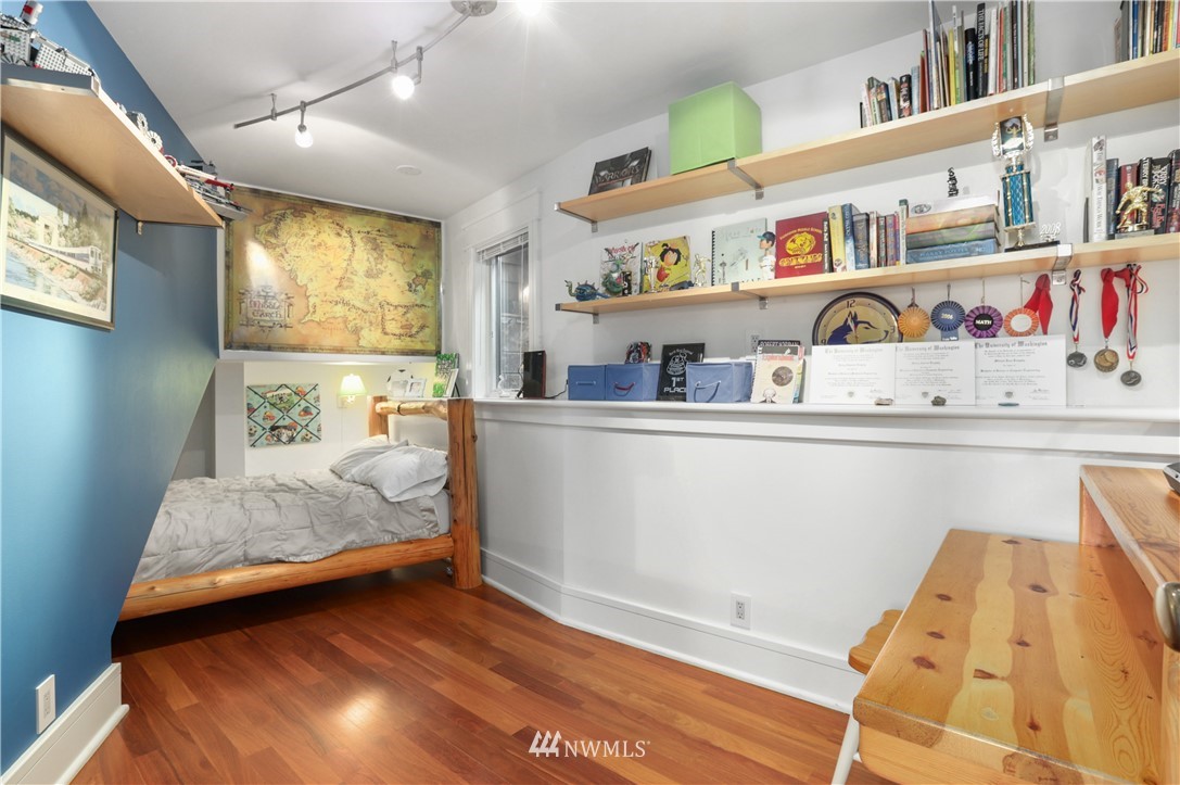 711 Briar Road Bellingham, WA 98225 - Photo 33 of 40 a living room with baby crib furniture and a window