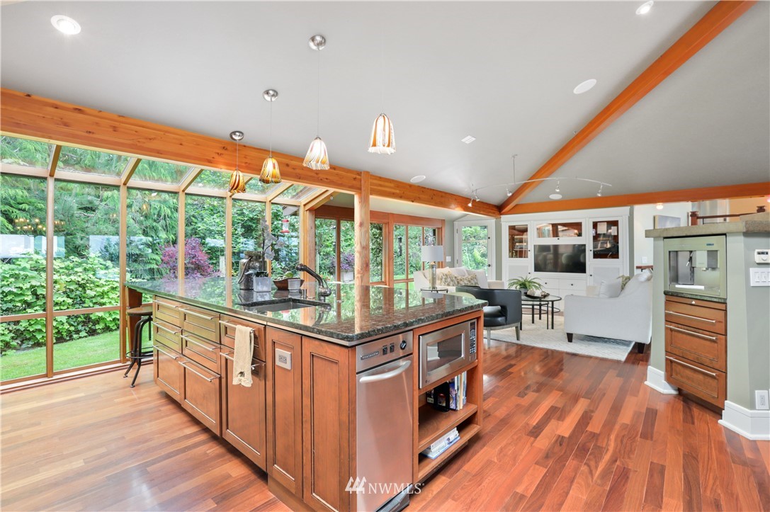 711 Briar Road Bellingham, WA 98225 - Photo 10 of 40 a kitchen with stainless steel appliances granite countertop a stove and wooden floor