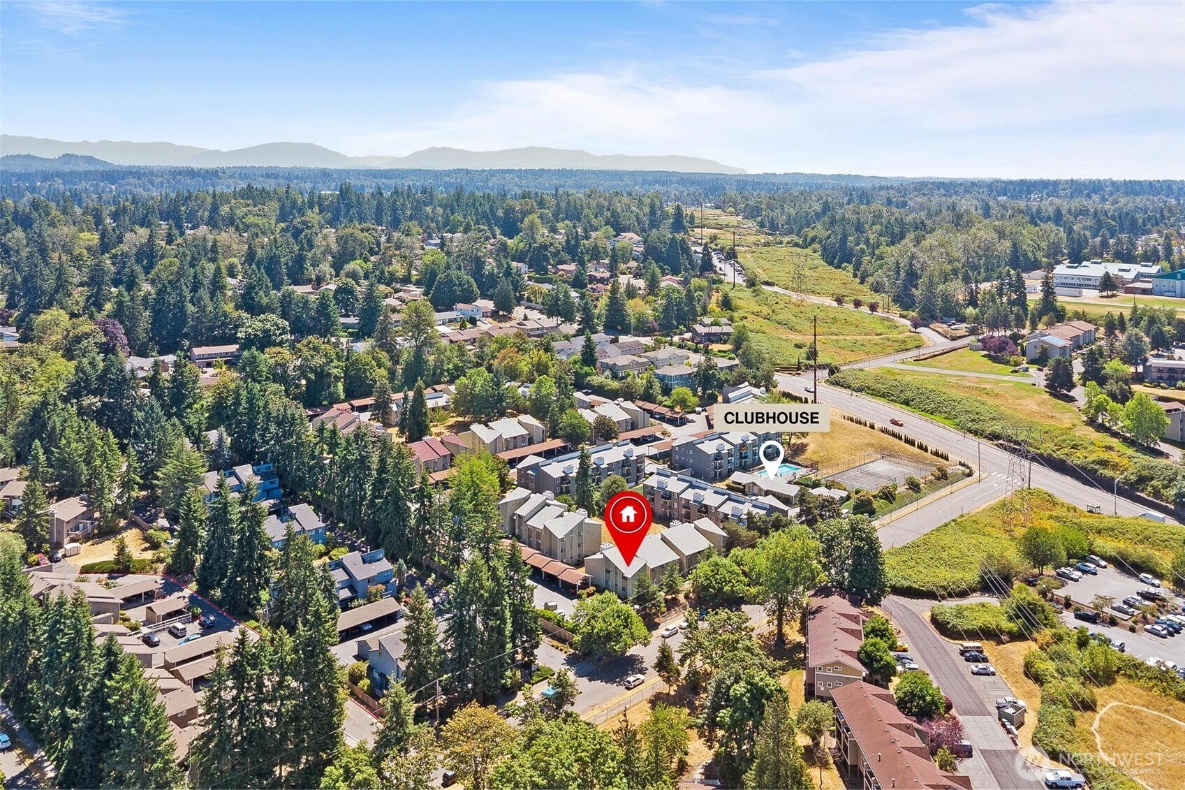 2020 Grant Avenue South, Unit B201 Renton, WA 98055 - Photo 18 of 20 an aerial view of residential houses with outdoor space