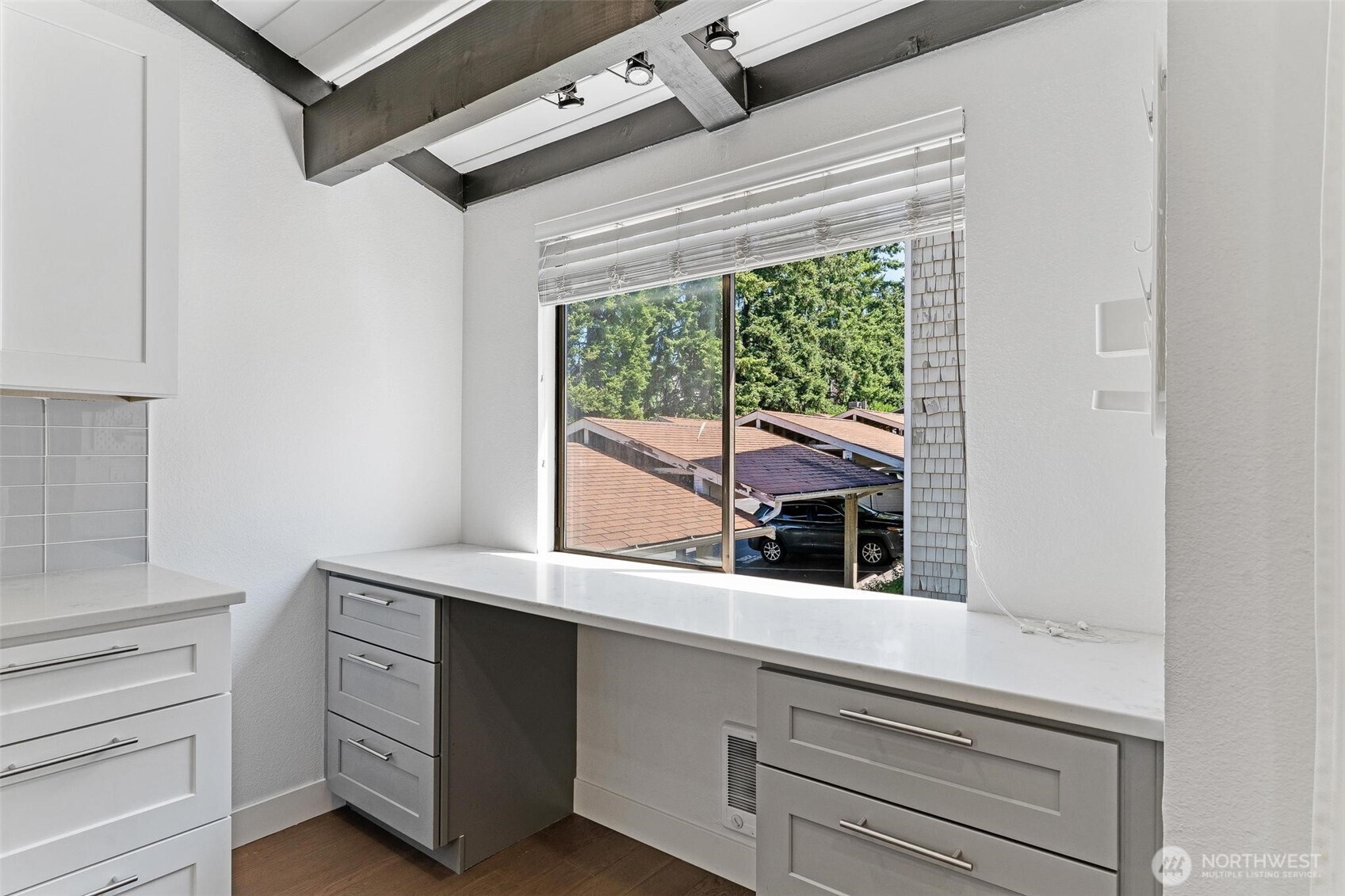 2020 Grant Avenue South, Unit B201 Renton, WA 98055 - Photo 3 of 20 a kitchen with a stove and a white cabinet