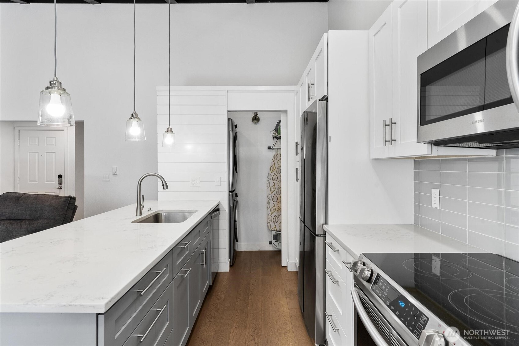 2020 Grant Avenue South, Unit B201 Renton, WA 98055 - Photo 5 of 20 a kitchen with a sink and a refrigerator