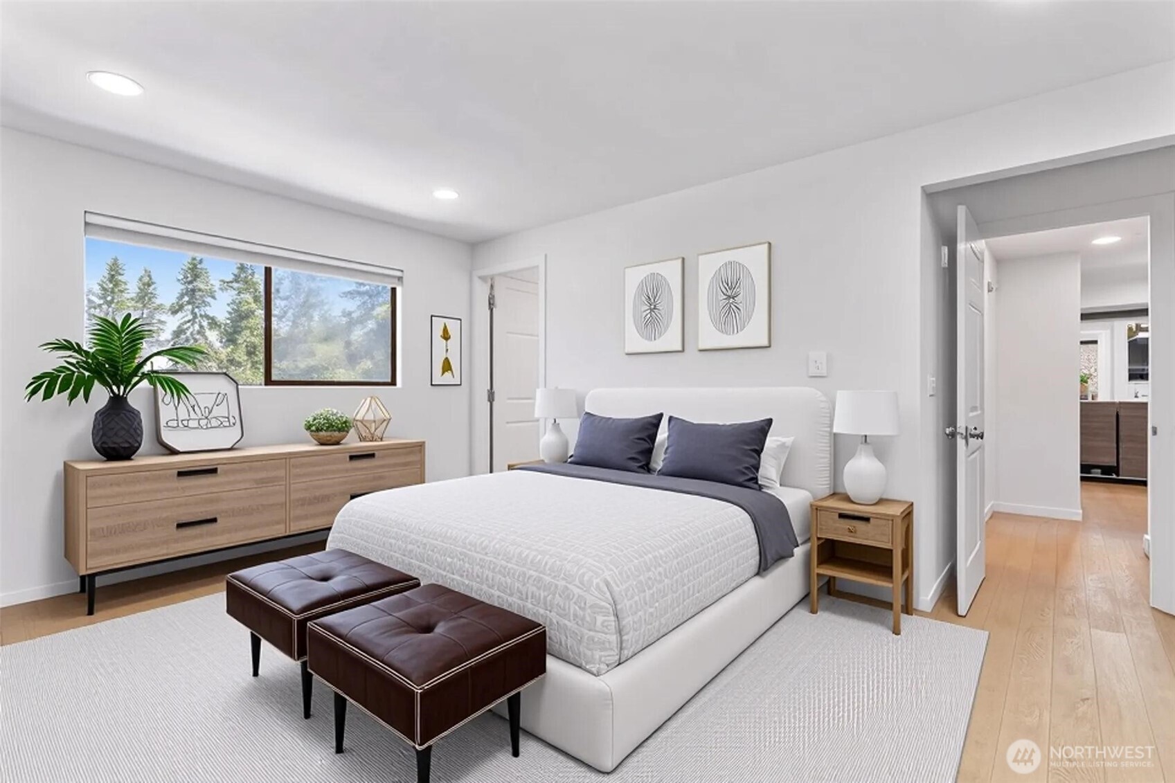 2020 Grant Avenue South, Unit B201 Renton, WA 98055 - Photo 8 of 20 a spacious bedroom with a bed and a couch