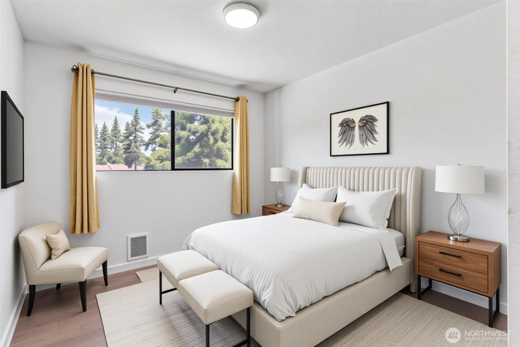 2020 Grant Avenue South, Unit B201 Renton, WA 98055 - Photo 10 of 20 a bedroom with a bed and a couch