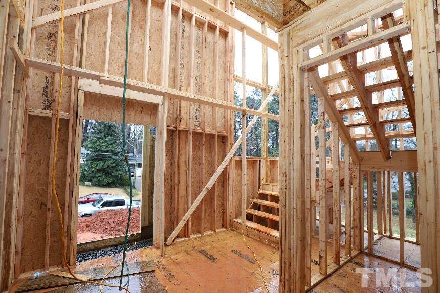 4809 Rampart Street Raleigh, NC 27609 - Photo 8 of 16 a view of an entryway with staircase