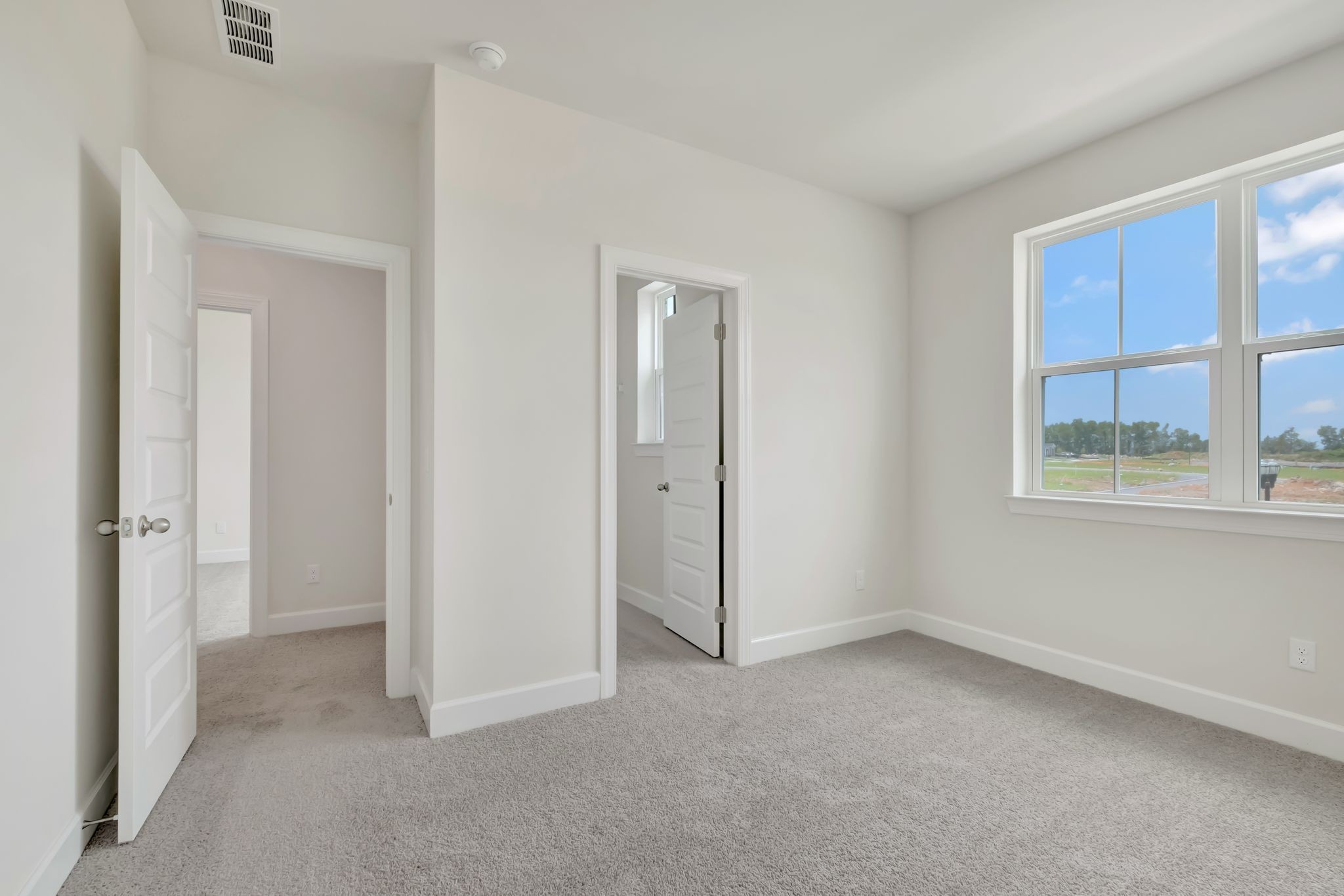 1109 Codah Drive Mount Juliet, TN 37122 - Photo 17 of 19 an empty room with windows and closet