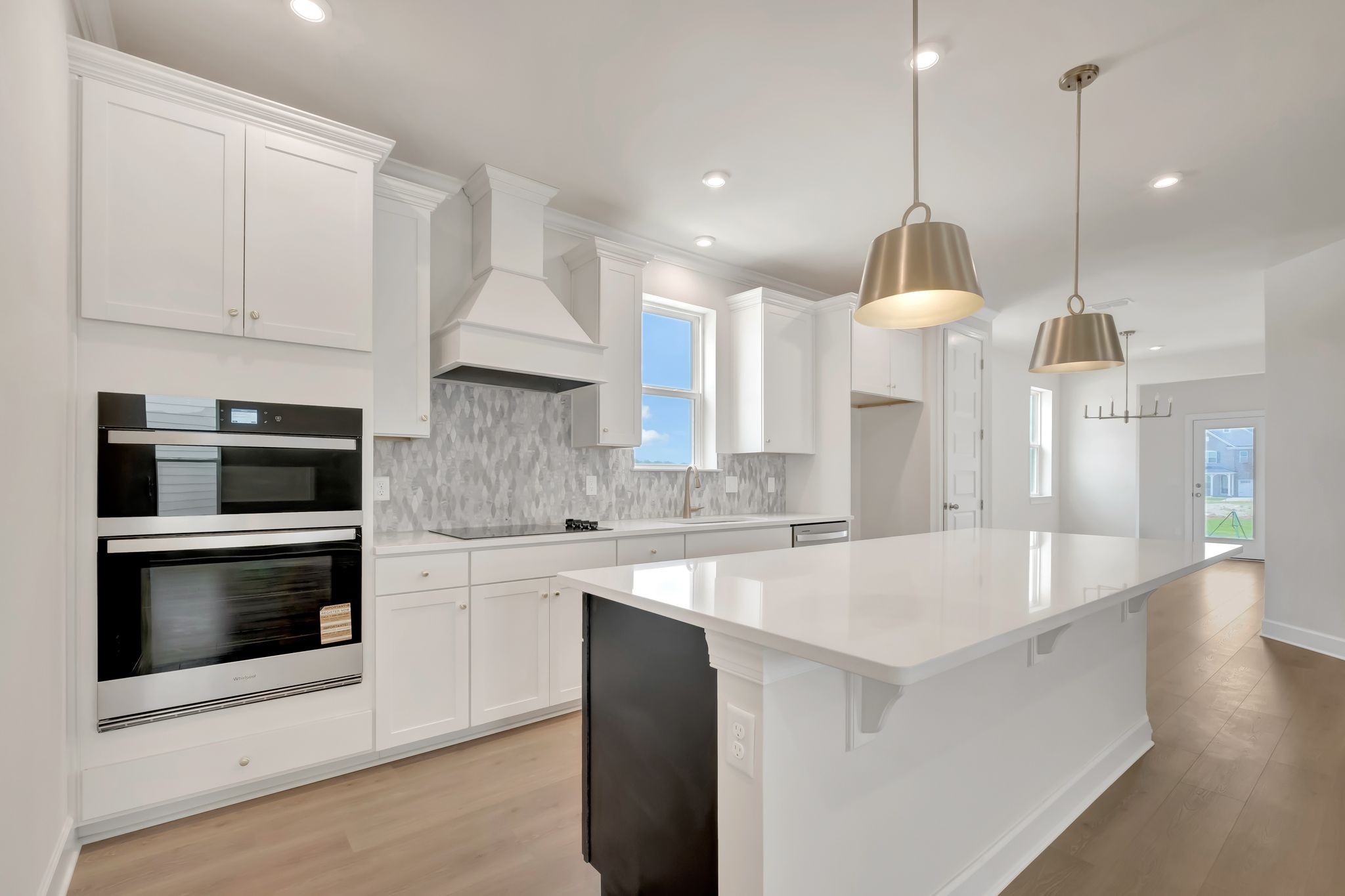 1109 Codah Drive Mount Juliet, TN 37122 - Photo 6 of 19 a kitchen with stainless steel appliances granite countertop a sink a stove and a wooden floors