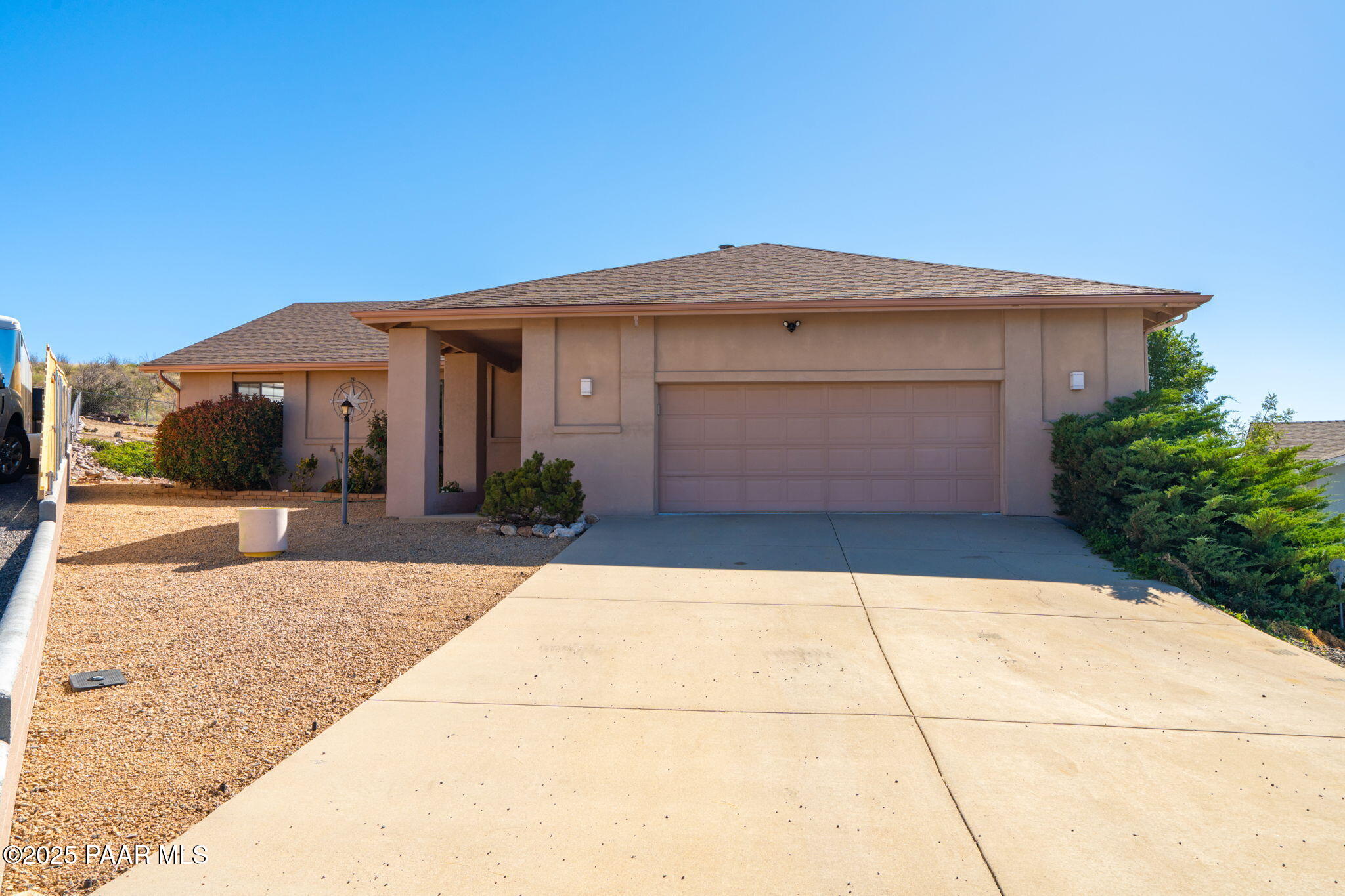 11992 Rawhide Ridge Dewey, AZ 86327 - Photo 1 of 46 a front view of a house with a yard