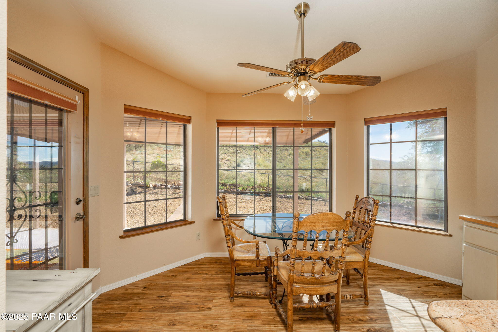 11992 Rawhide Ridge Dewey, AZ 86327 - Photo 11 of 46 a view of a dining room with furniture window and outside view