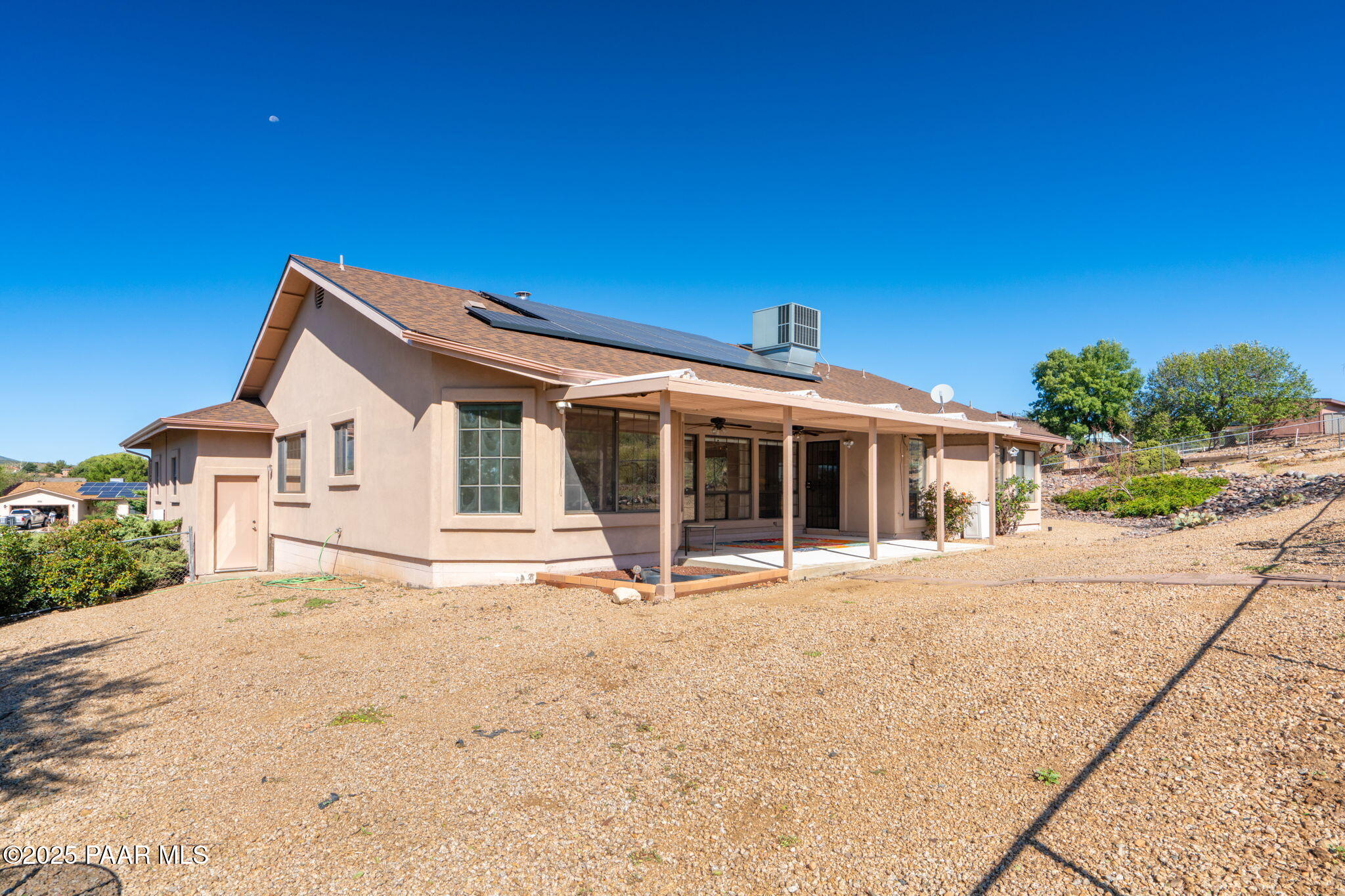 11992 Rawhide Ridge Dewey, AZ 86327 - Photo 27 of 46 a front view of a house with a yard