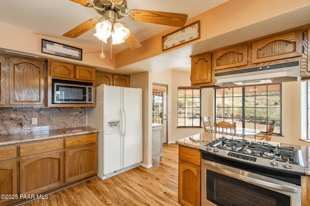 a bedroom with a bed and a fireplace