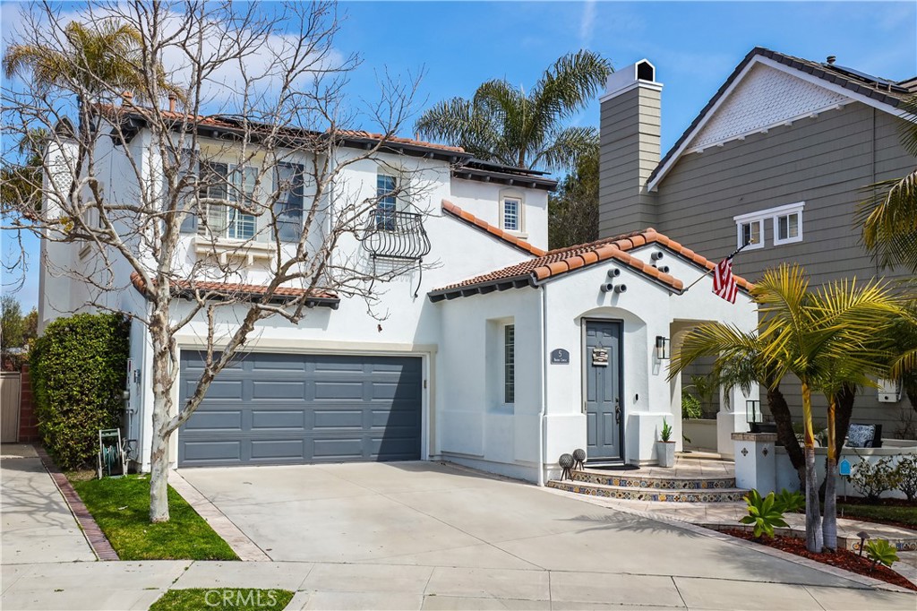 5 Baudin Circle Ladera Ranch, CA 92694 - Photo 1 of 1 a front view of a house with tree s