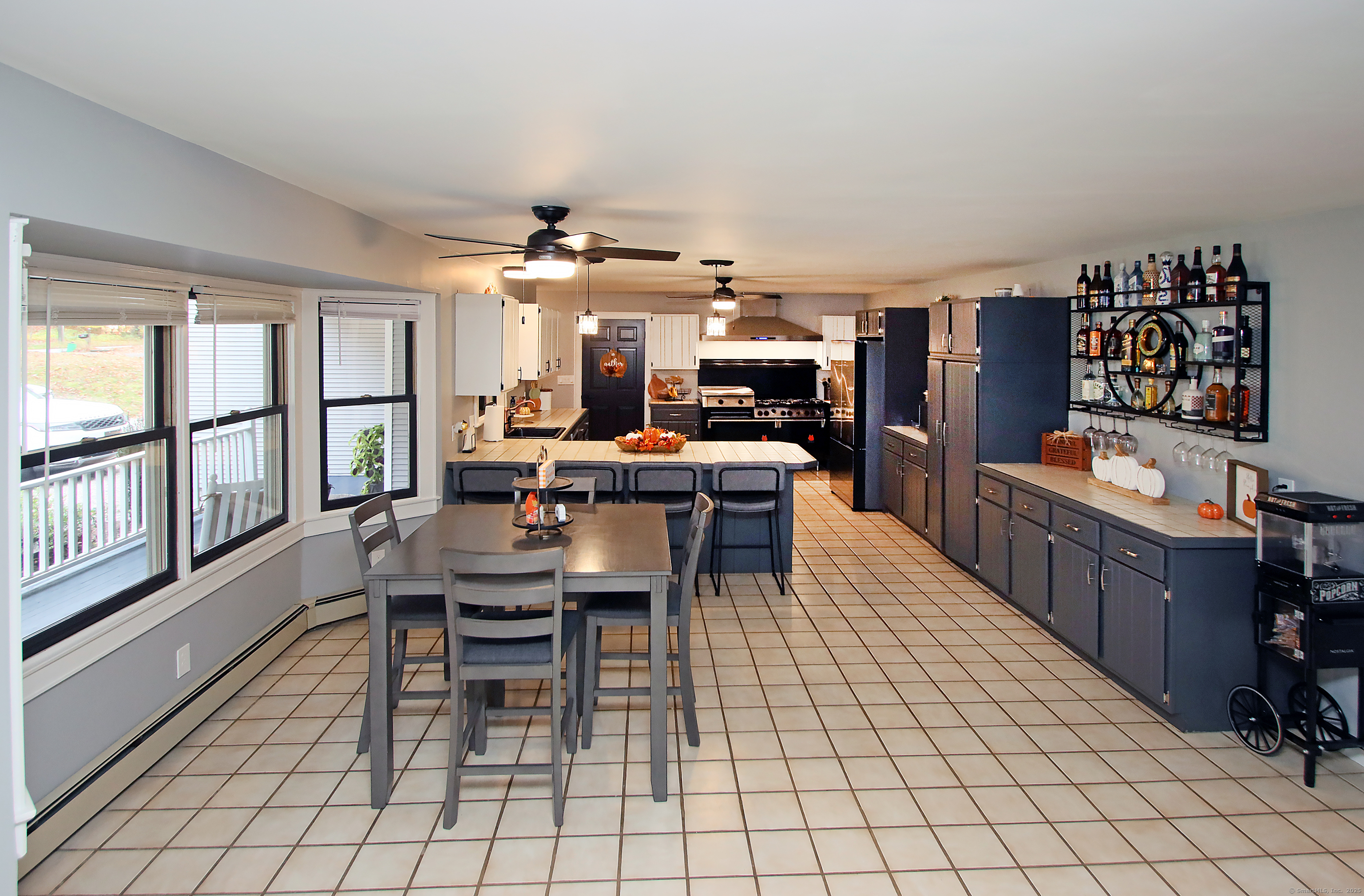 821 Essex Road Westbrook, CT 06498 - Photo 11 of 40 a view of a dining room with furniture