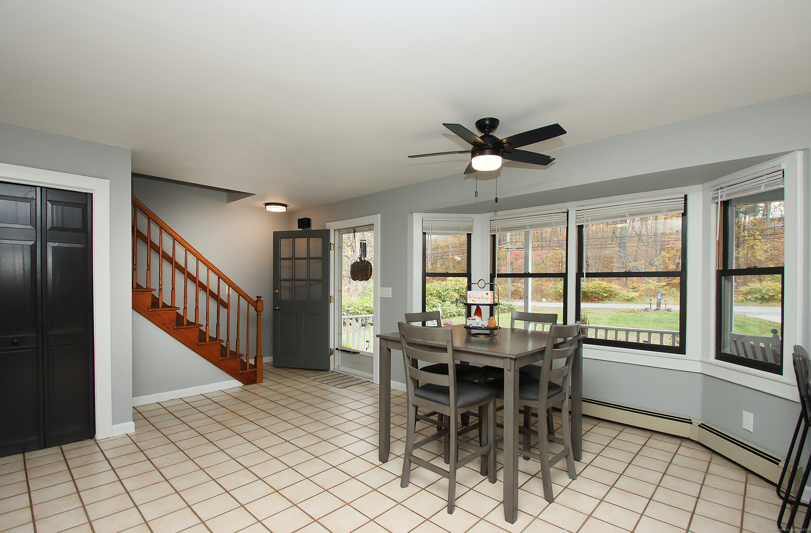 821 Essex Road Westbrook, CT 06498 - Photo 15 of 40 a dining room with furniture and window