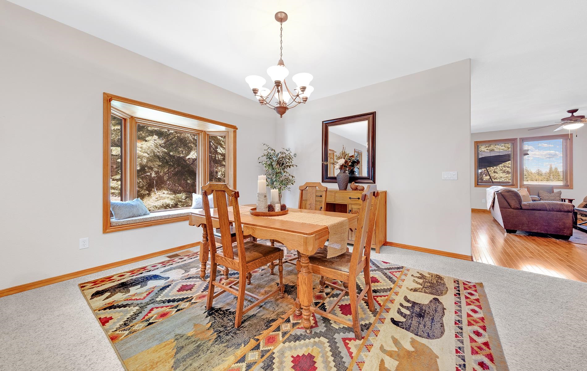 627 Deep Forest Road Lake Almanor, CA 96137 - Photo 5 of 29 a view of a dining room with furniture and chandelier