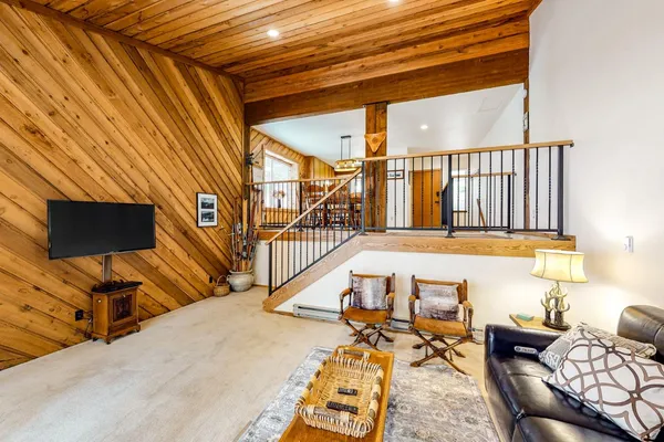 a view of a balcony with furniture