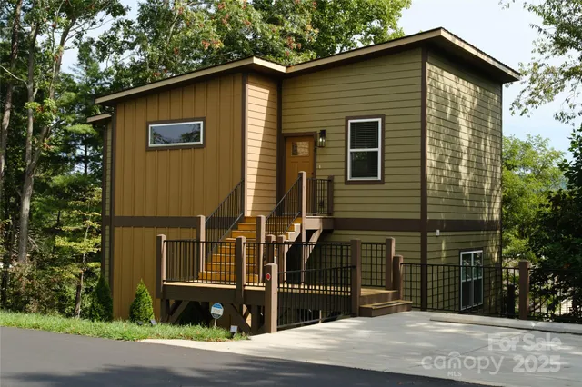 a front view of a house with garage