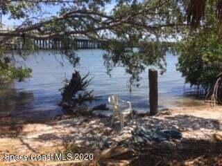 4100 Main Street Sebastian, FL 32976 - Photo 11 of 16 a view of a street with large trees