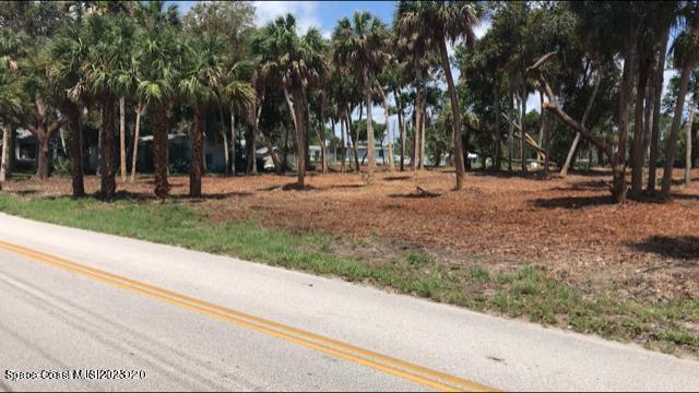 4100 Main Street Sebastian, FL 32976 - Photo 4 of 16 a view of road with trees