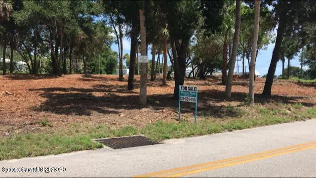 a view of a lake next to a building