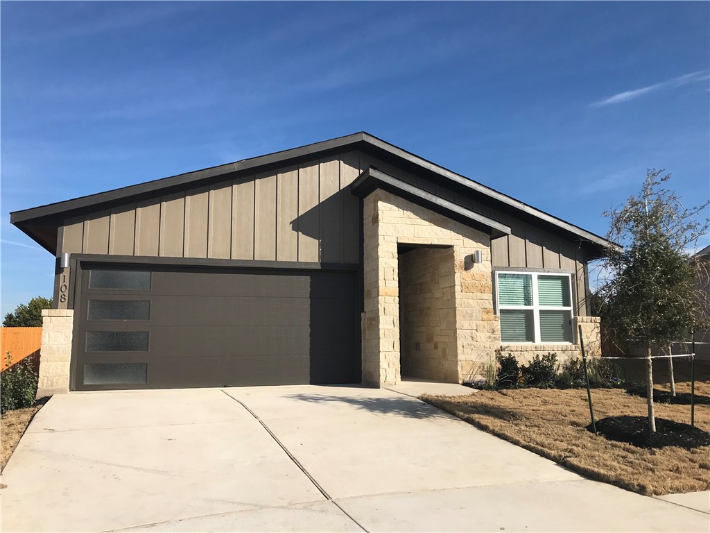 108 Deserti Road Leander, TX 78641 - Photo 1 of 1 a front view of a house with garage