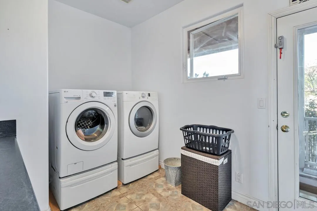 1880 Keyes Road Ramona, CA 92065 - Photo 13 of 49 a utility room with dryer and washer