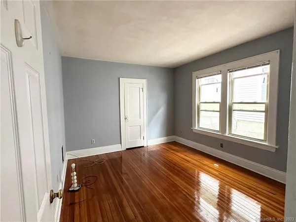 a view of an empty room and window