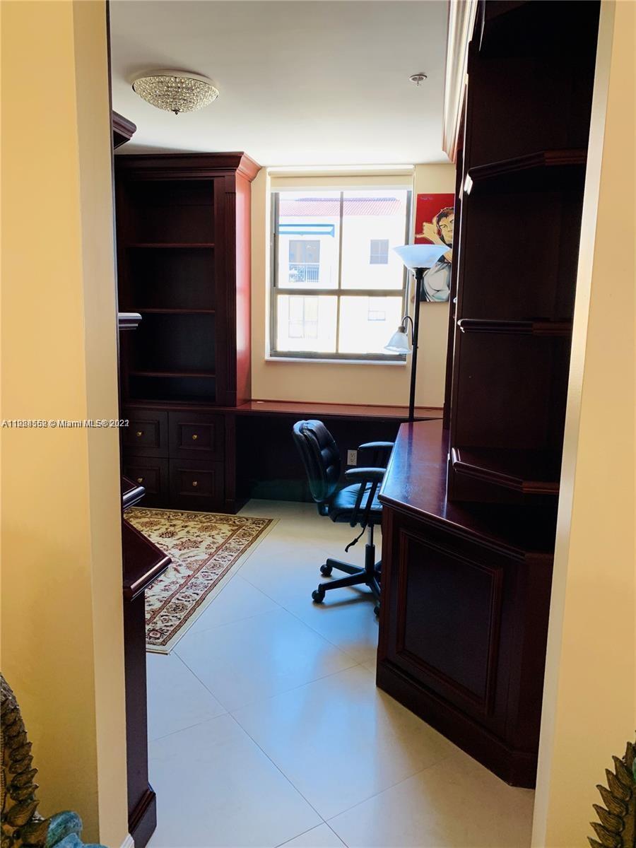 Glenvar Heights Miami, FL 33143 - Photo 10 of 19 a view of walk in closet with a window