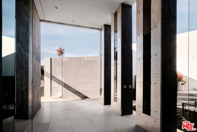 a view of a terrace with sitting area