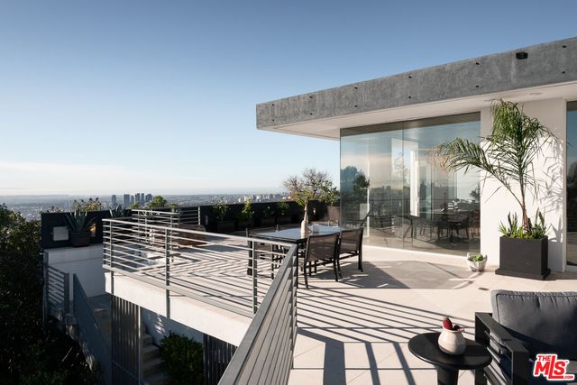 a view of a car in front of a house