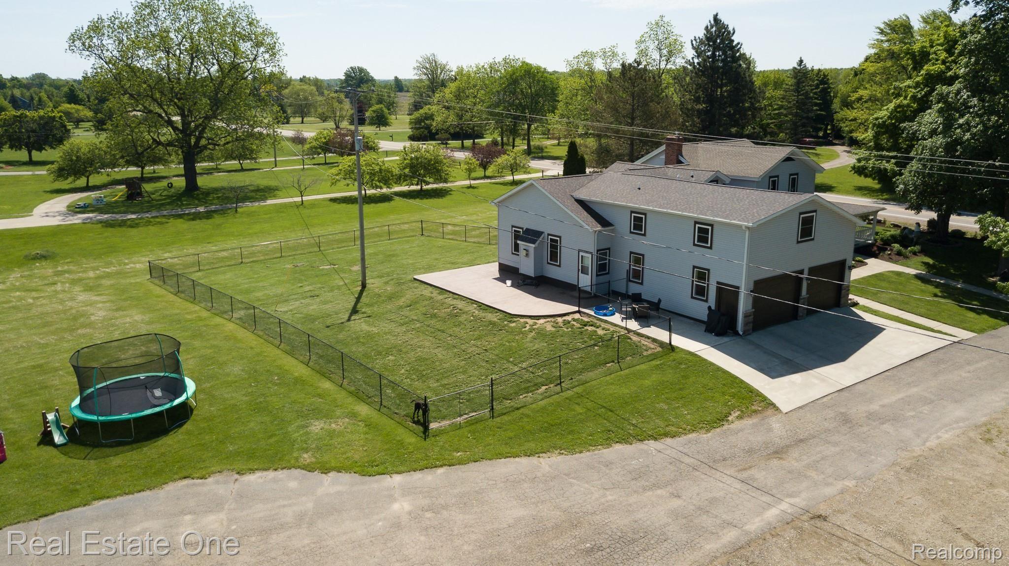 8047 Perry Road Grand Blanc, MI 48439 - Photo 6 of 48 Large Fenced in area great for pets or kids to play!