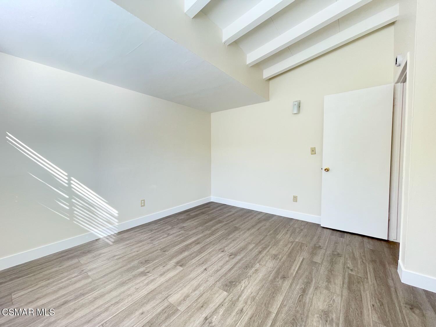 4120 Hi Drive Simi Valley, CA 93063 - Photo 17 of 29 a view of an empty room with wooden floor