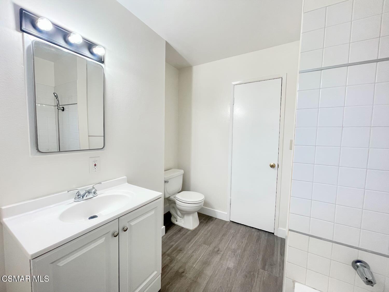 4120 Hi Drive Simi Valley, CA 93063 - Photo 19 of 29 a bathroom with a toilet a sink and mirror