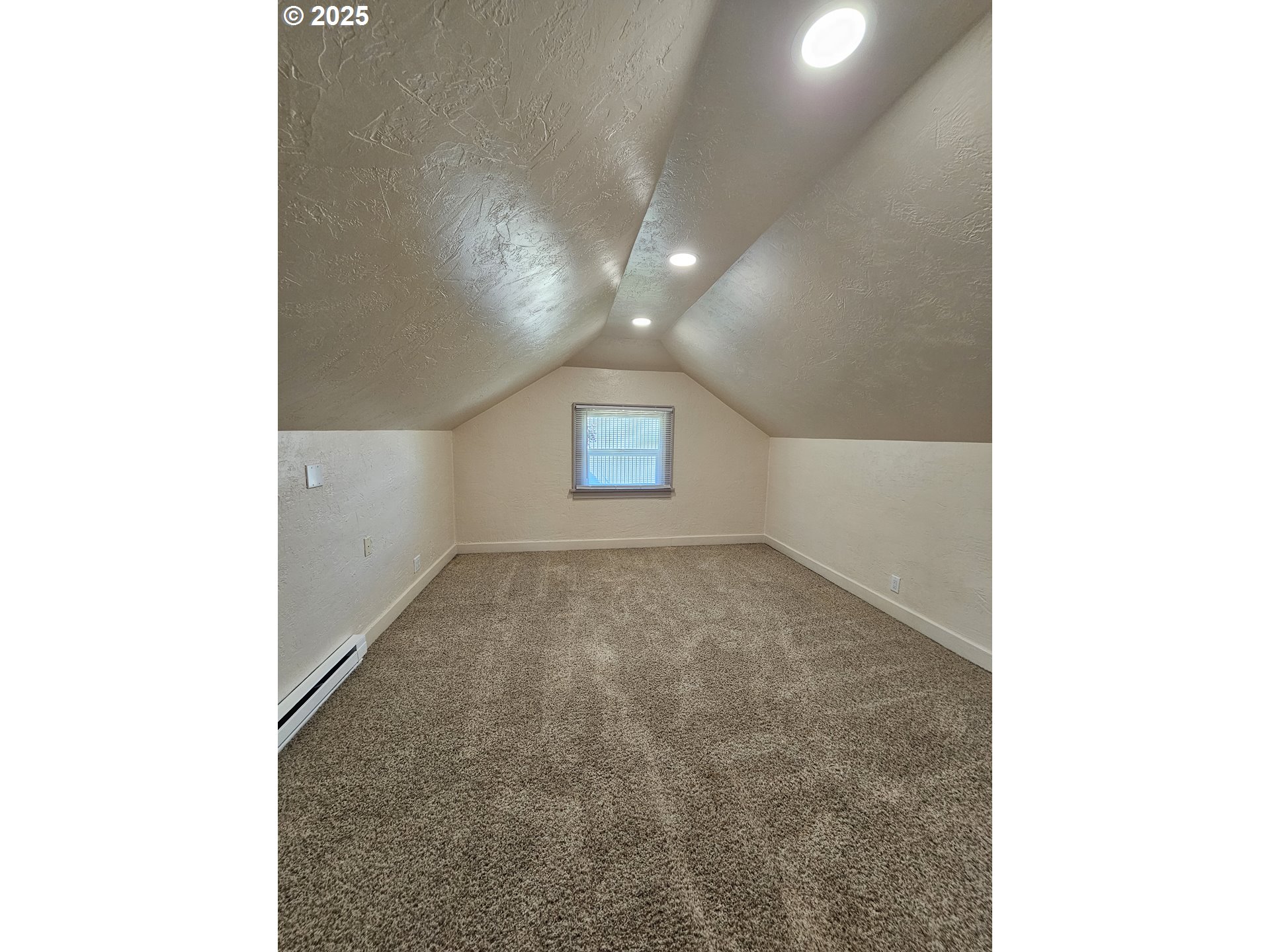 1760 West Broadway Eugene, OR 97402 - Photo 29 of 40 a view of a hallway with a window