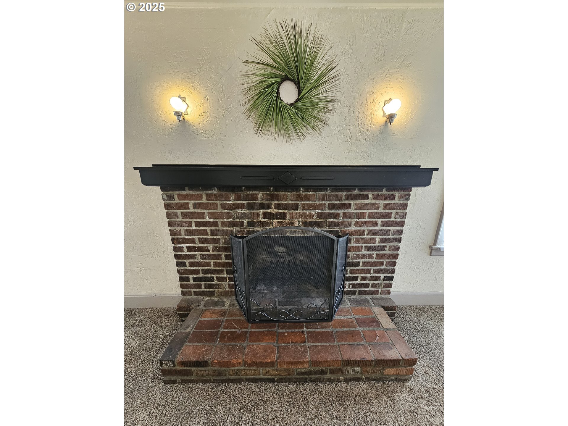 1760 West Broadway Eugene, OR 97402 - Photo 5 of 40 a living room with a fireplace