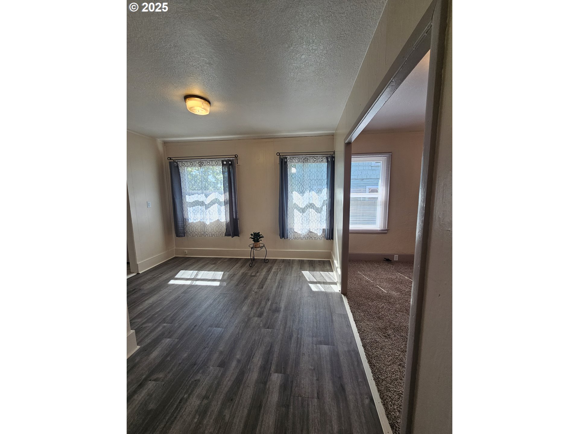 1760 West Broadway Eugene, OR 97402 - Photo 10 of 40 a view of entryway with wooden floor