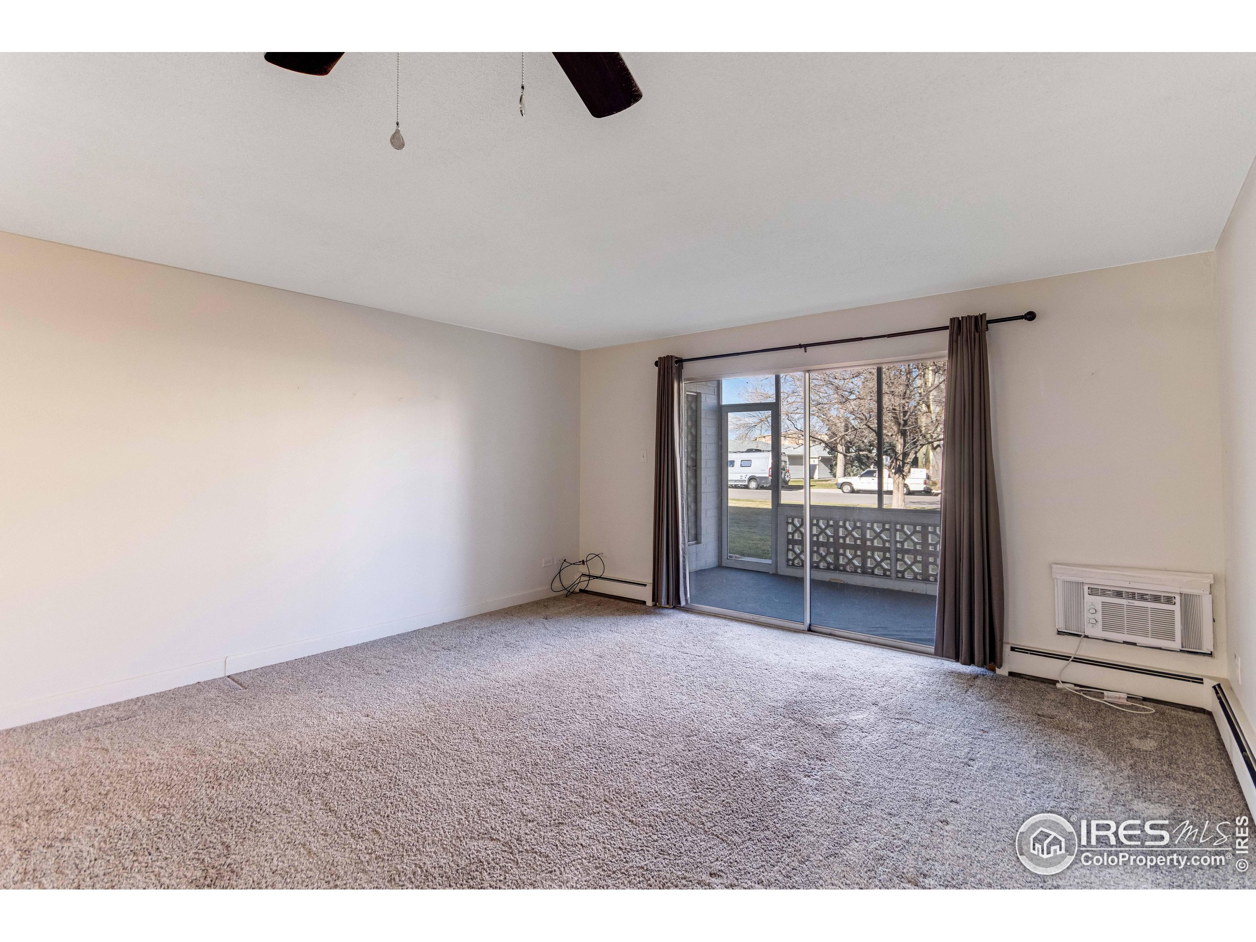 735 South Alton Way Denver, CO 80247 - Photo 20 of 29 an empty room with windows
