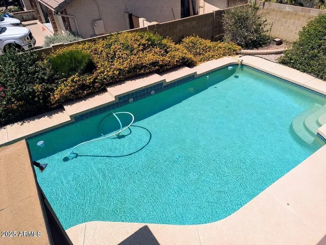 a view of a backyard with a garden