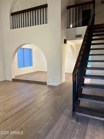 a view of entryway with wooden floor