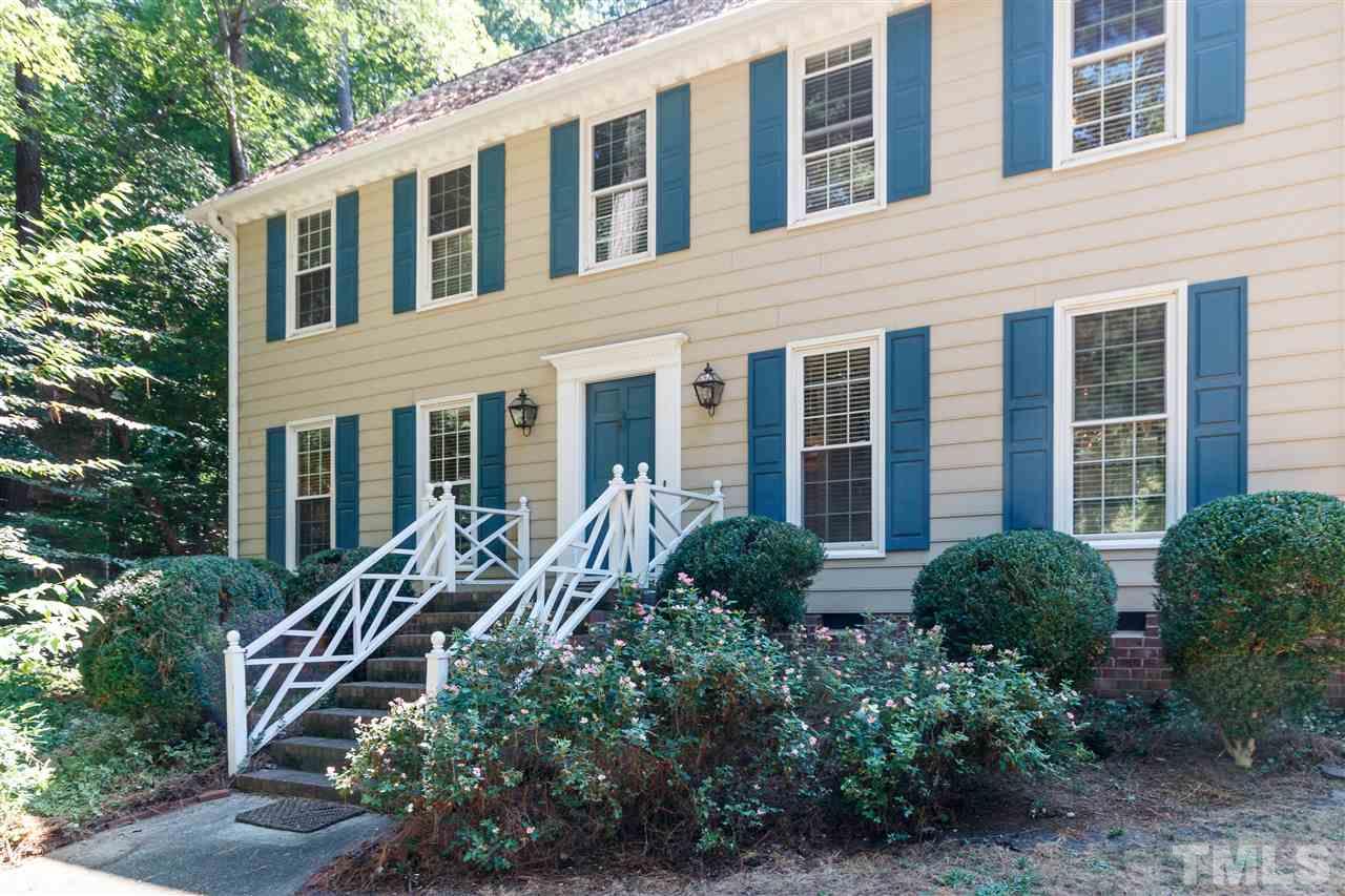 4921 Springwood Drive Raleigh, NC 27613 - Photo 2 of 25 a house view with a garden space