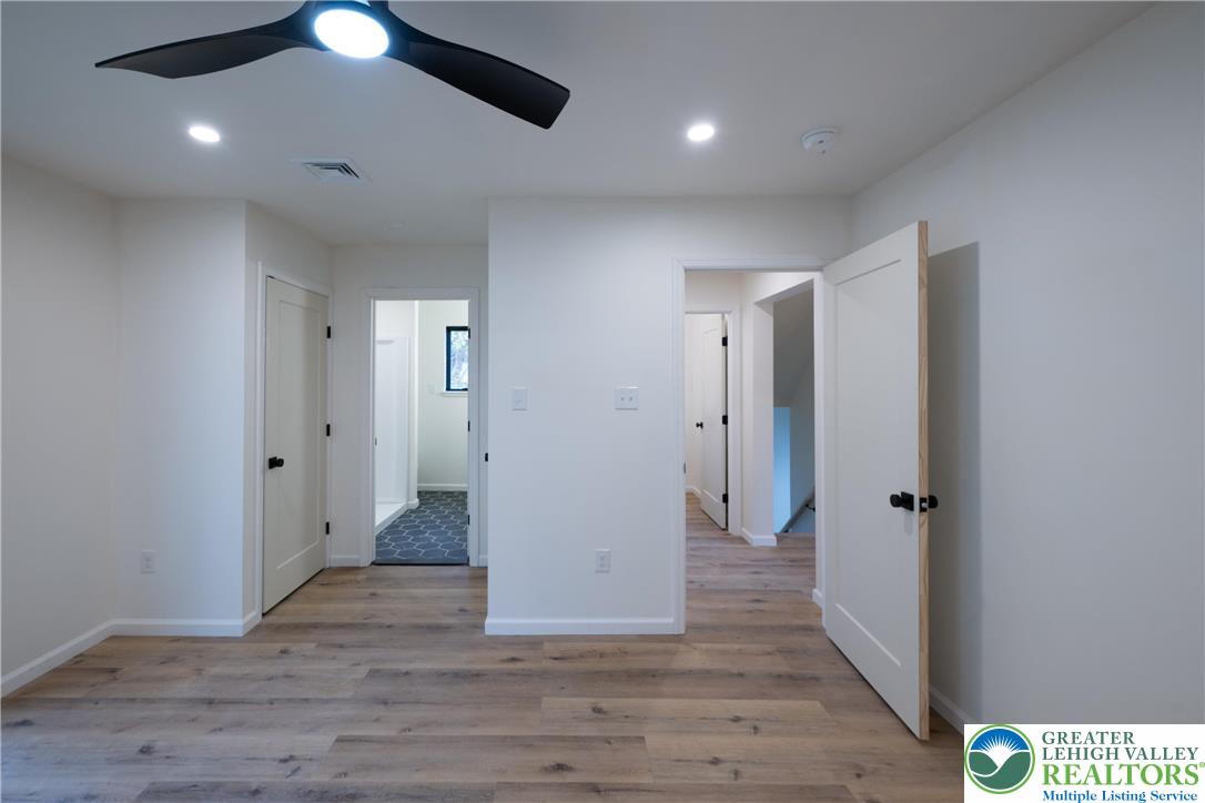111 Main Street Glendon, PA 18042 - Photo 13 of 33 a view of a hallway with wooden floor