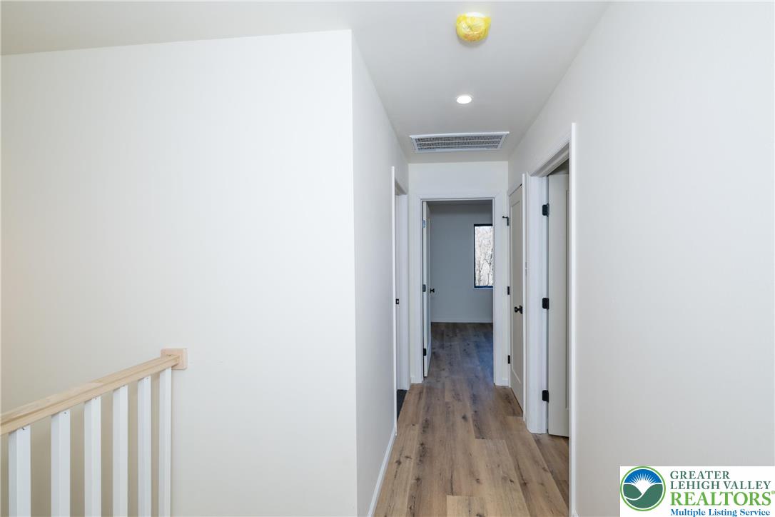 111 Main Street Glendon, PA 18042 - Photo 17 of 33 a view of a hallway with wooden floor