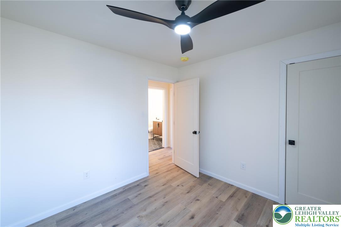 111 Main Street Glendon, PA 18042 - Photo 23 of 33 a view of an empty room and wooden floor