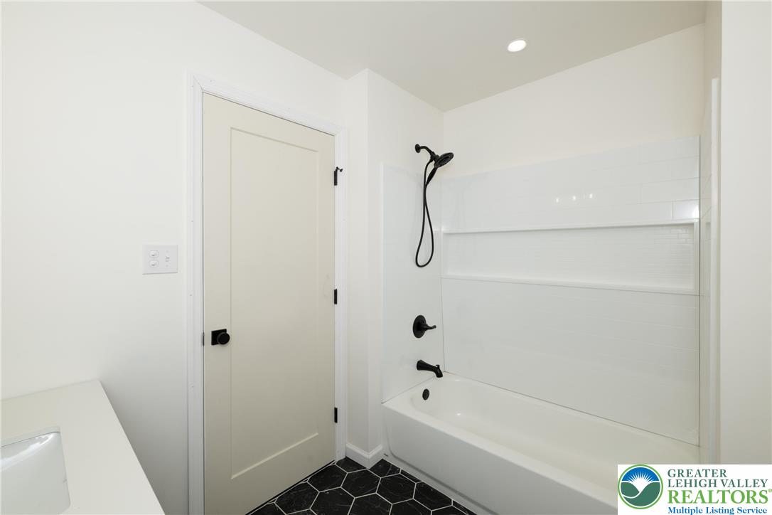 111 Main Street Glendon, PA 18042 - Photo 25 of 33 a bathroom with a bathtub and shower
