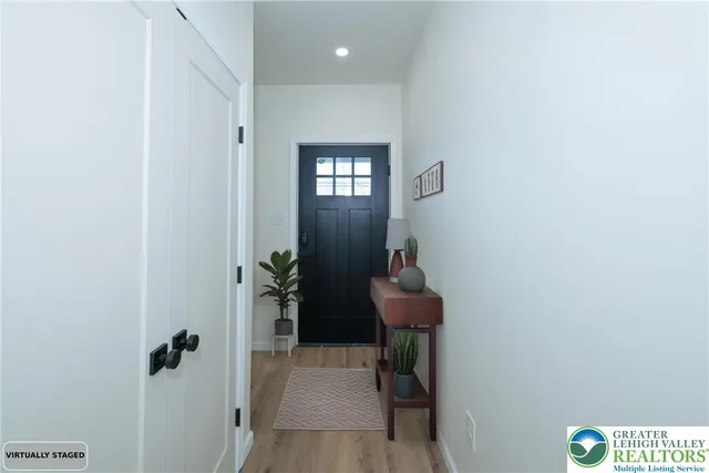 a view of a hallway with closet
