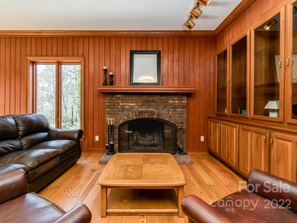 2214 Wishbone Road Monroe, NC 28112 - Photo 11 of 44 a living room with furniture a window and a fireplace