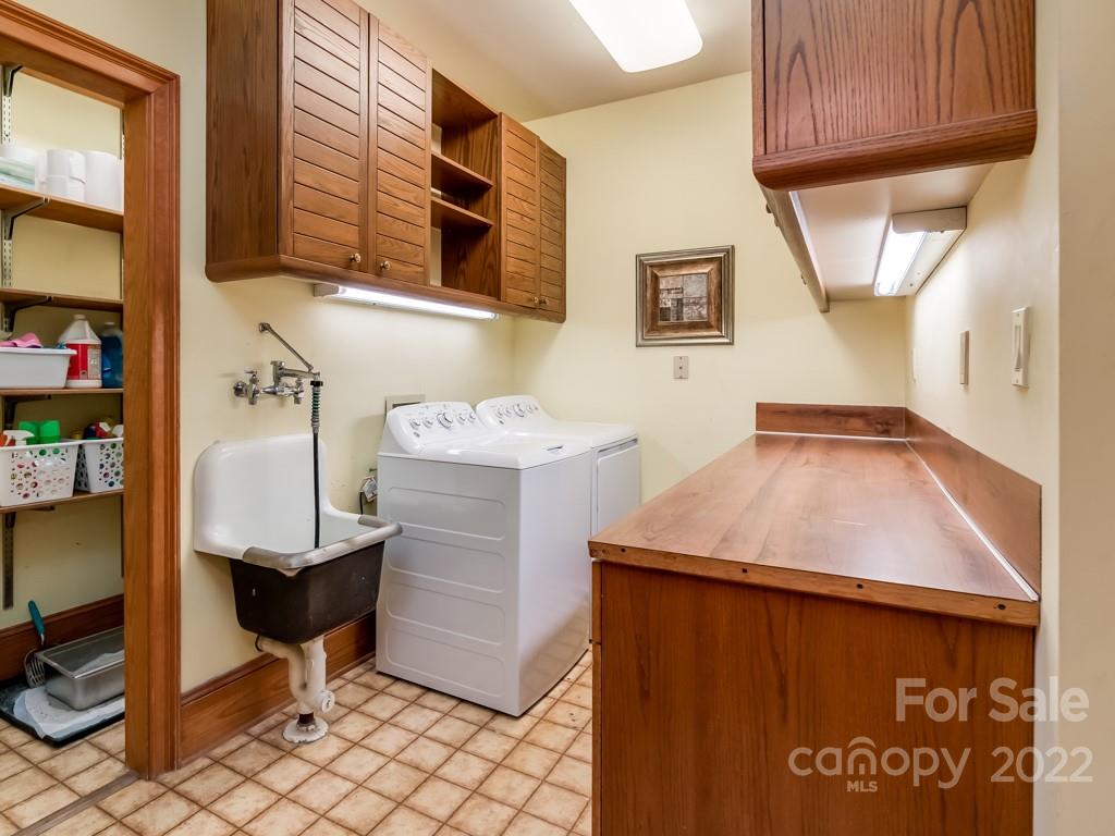 2214 Wishbone Road Monroe, NC 28112 - Photo 21 of 44 a room with storage and utility