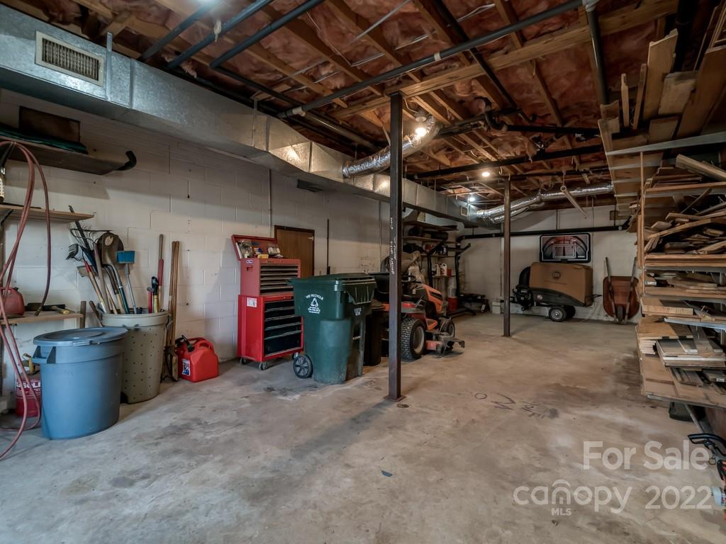2214 Wishbone Road Monroe, NC 28112 - Photo 42 of 44 a view of a storage room with a lot of stuff